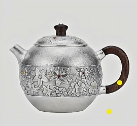 Fine silver handcrafted teapot with intricate carvings £1008 order number 854