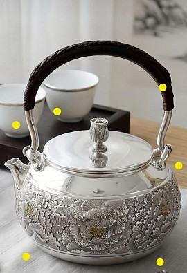 Fine silver teapot with intricately carved motifs £2800 order number 548
