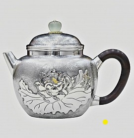 Fine sterling silver handcrafted with plant relief teapot £1500 order number 880