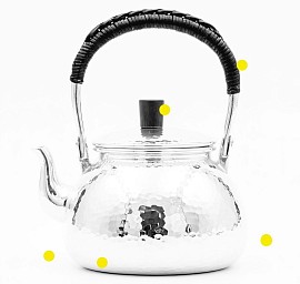Sterling silver teapot with woven rattan handle £4008 order number 505