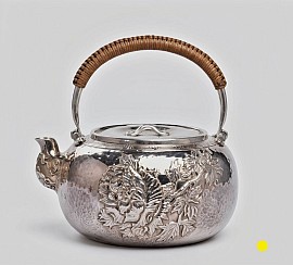 Sterling silver handcrafted teapot with woven bamboo handle £5000 order number 808