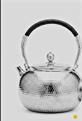 Sterling hammered silver teapot with rattan handle £5000 order number 508