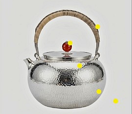 Sterling silver teapot with rattan handle & jade finial £4008 order number 555