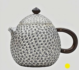 Hammered sterling silver teapot with dark wood handle £1500 order number 058
